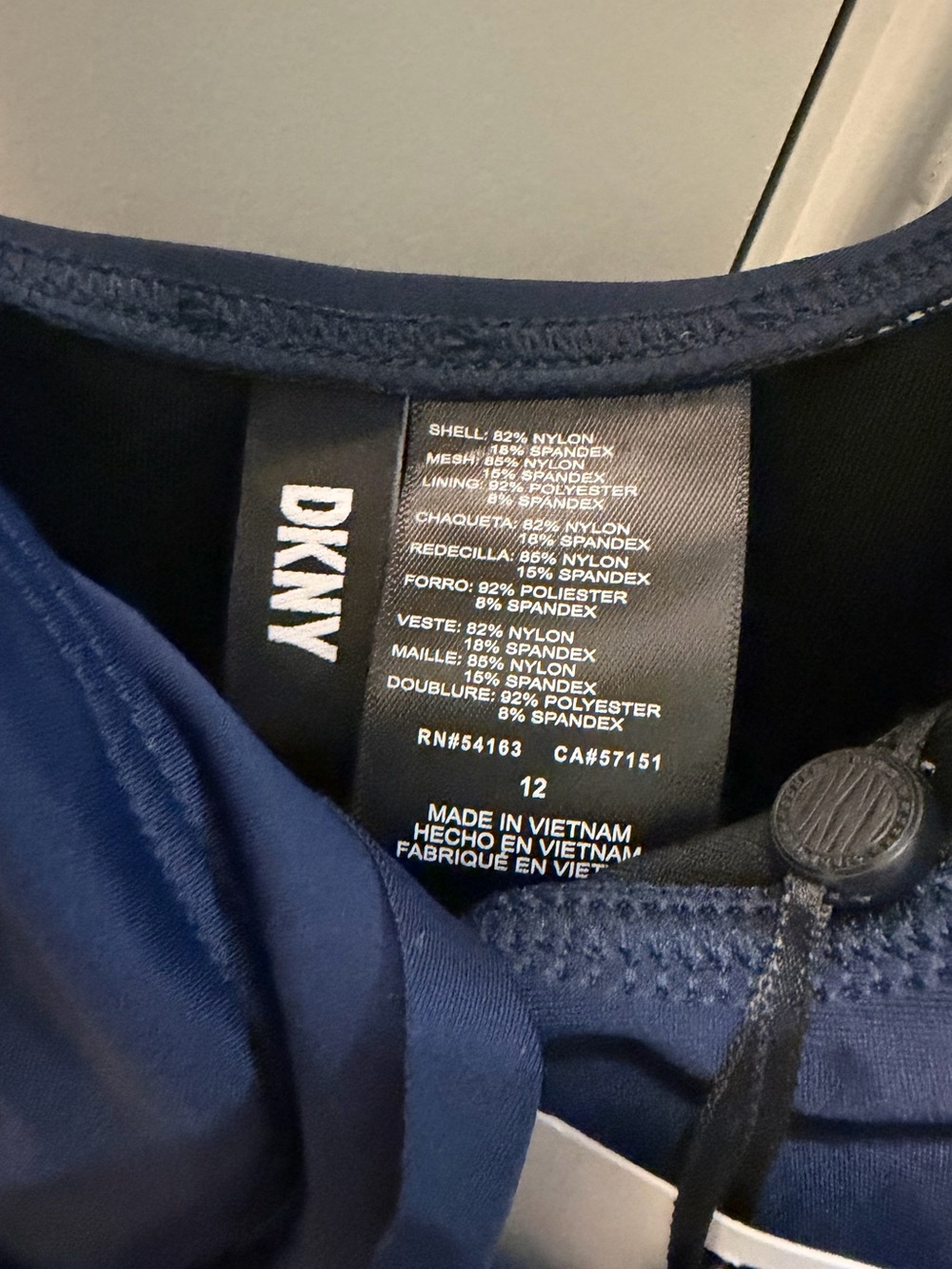 DKNY Women’s Navy Ruffle Plunge Tummy Control one piece swimsuit NWT Size 12 - Picture 4 of 14